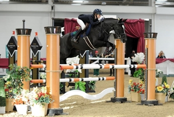 Tabitha Kyle wins the Pony Foxhunter Championship